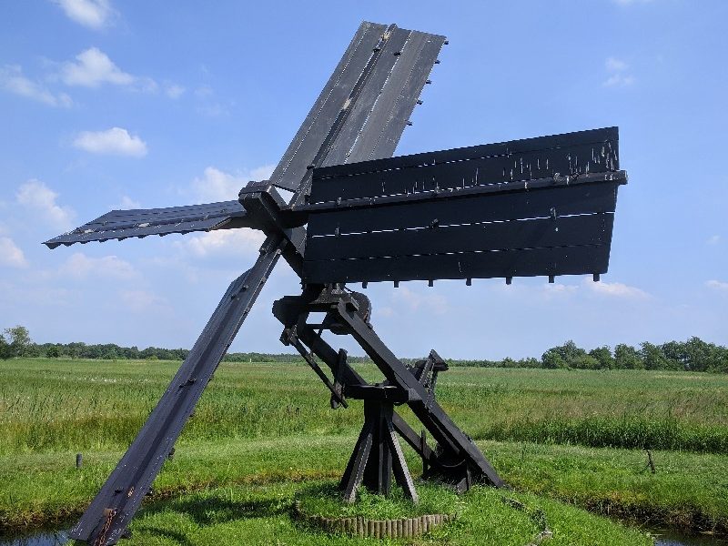 Wooden tjasker (small windmill) in the meadows around Giethoorn