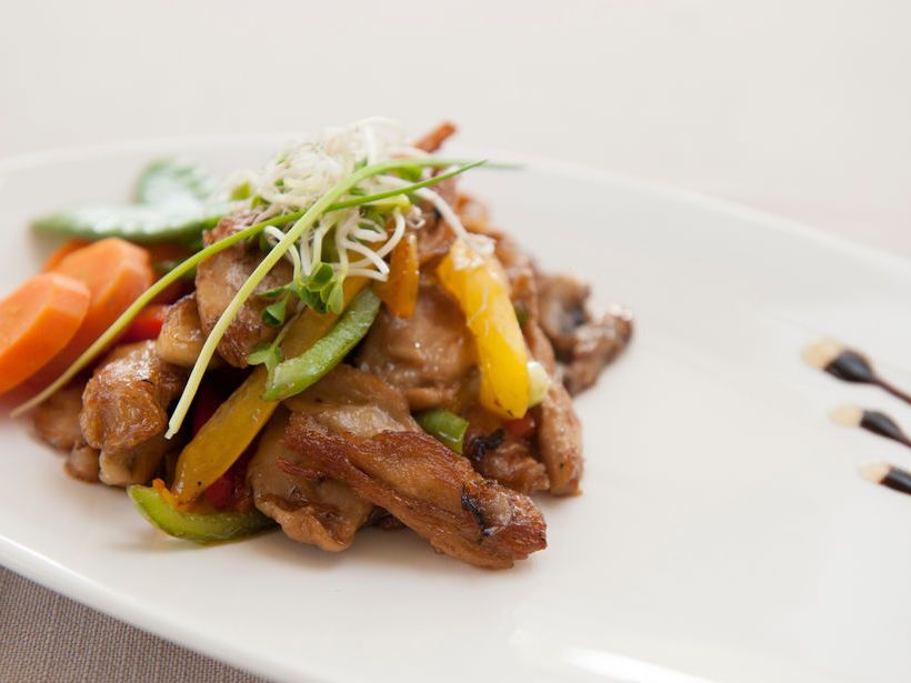 Dish on a white plate at De Dames van de Jonge