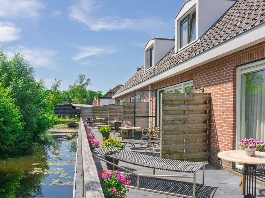 Deluxe rooms with their own terrace on the water at Hotel De Harmonie in Giethoorn