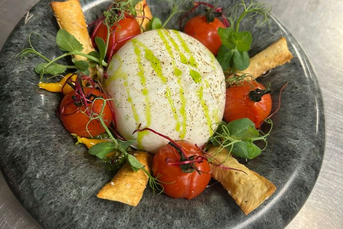 Dish on a stone plate at De Grachthof