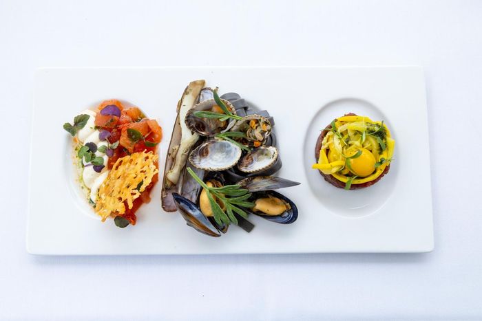 Small dishes on a white platter at Villa Bodelaeke