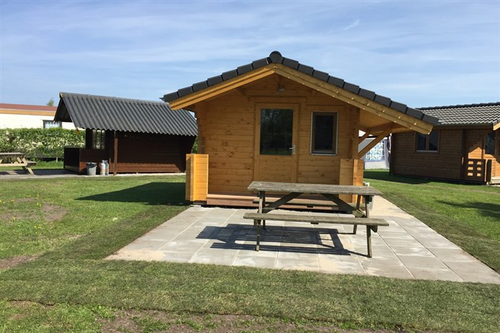 Wooden trekking cabins at Camping D'Hof in Giethoorn